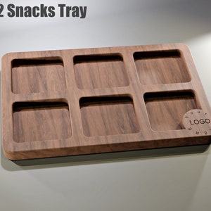 May include: A wooden 3x2 snacks tray with six square compartments. The tray has a dark wood grain finish and a black base. The text "3x2 Snacks Tray" is at the top. A small circular area is available for a logo.