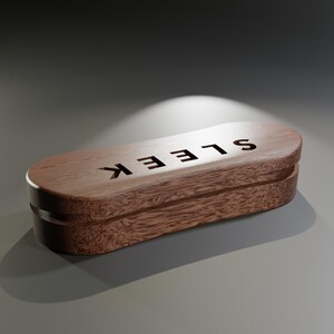 May include: A wooden, rectangular box with the word "SLEEK" carved into the top. The box has a dark brown finish with a visible wood grain pattern. The box is closed and has a sleek, modern design.