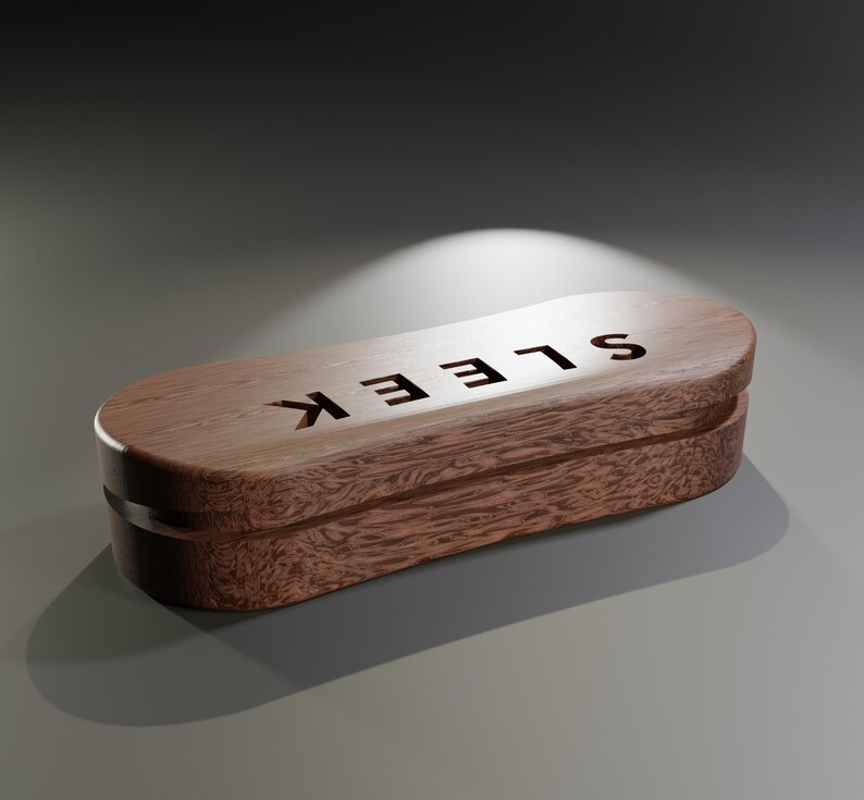 May include: A wooden, rectangular box with the word "SLEEK" carved into the top. The box has a dark brown finish with a visible wood grain pattern. The box is closed and has a sleek, modern design.