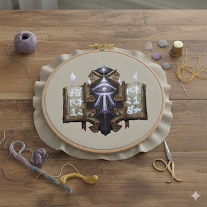 Puede incluir: Bordado de punto de cruz de un diseño de fantasía en un aro de madera. El diseño presenta un emblema central con un ojo estilizado, flanqueado por lo que parecen ser libros. Los suministros de bordado, incluyendo hilo, tijeras y un dedal, están dispuestos alrededor del aro.