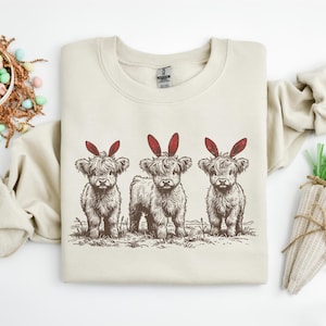 Easter Highland Cow Sweatshirt, Cute Easter Cow Shirt, Bunny Ear Cow Shirt, Funny Easter Gift For Men Women & Kids, Easter Western Shirt