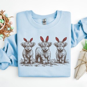 Easter Highland Cow Sweatshirt, Cute Easter Cow Shirt, Bunny Ear Cow Shirt, Funny Easter Gift For Men Women & Kids, Easter Western Shirt