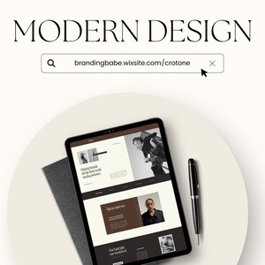 May include: A tablet computer displaying a website with the text "brandingbabe.wixsite.com/crotone" in the address bar. The website features images of people and text about their social media presence. The tablet is on a white surface with a black notebook and a black pen.