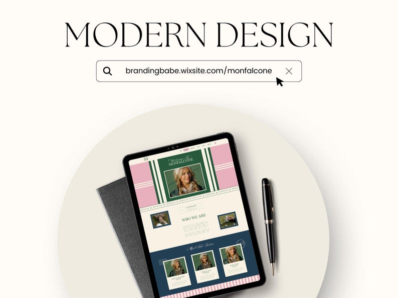 May include: A tablet displaying a website design with a pink and green color scheme, a photo of a woman, and the text "Modern Design." A black pen and a gray notebook are next to the tablet on a white surface.