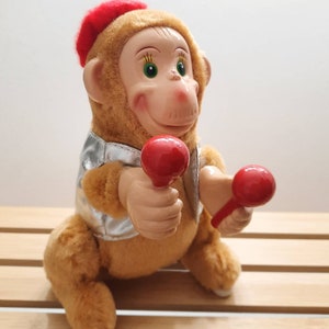 Vintage Jumping Monkey with Maracas Toy somersaulting mechanical Circus Animal