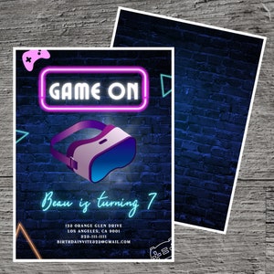 May include: A blue and purple neon sign that says "GAME ON" with a virtual reality headset in front of it. The background is a blue brick wall. The text "Beau is turning 7" is below the headset. The invitation includes an address, phone number, and email address.