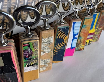 Recycled skateboard bottle opener