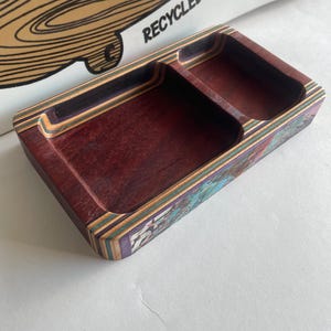 Tray made from recycled skateboards and padauk.