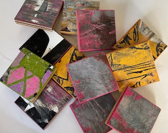 Recycled skateboard refrigerator magnets.