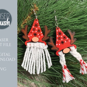 May include: A pair of red and white Christmas gnome earrings with white yarn beards and red and white yarn braids. The gnomes have antlers and white polka dots on their hats.
