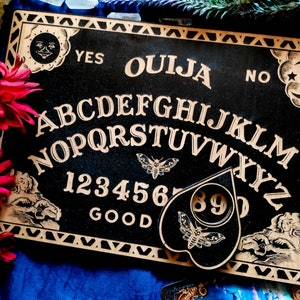 Ouija board from wood, classic spirit board Ouija, Occult practice, Spirit game for talking to the souls of the dead, Witchcraft decor