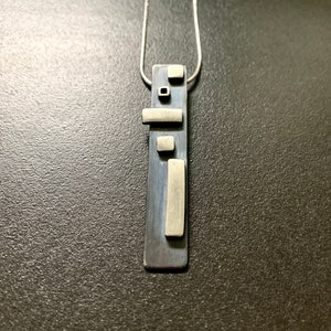 Geometric collage sterling silver pendant