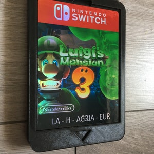 Cartucho gigante para Nintendo Switch, Luigi's Mansion 3. Imprescindible para cualquier decoración o exhibición de pared de una sala de juegos. imagen 4