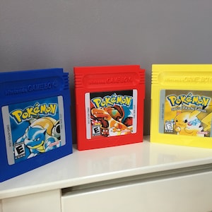 Bumper 3 Pack, kartridże Nintendo Giant Size, kartridże Pokémon w kolorze czerwonym, żółtym i niebieskim (opakowanie 3 szt.)