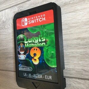 Cartucho gigante para Nintendo Switch, Luigi's Mansion 3. Imprescindible para cualquier decoración o exhibición de pared de una sala de juegos. imagen 3