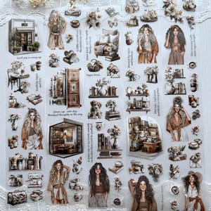 May include: A sheet of decorative stickers featuring illustrations of women, coffee, books, and floral arrangements. The color palette includes browns, creams, and touches of gold, with some text elements.