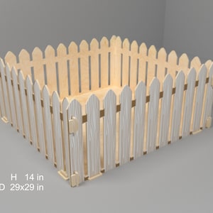 May include: A wooden picket fence playpen for a pet or child. The fence is 14 inches tall and 29 inches wide and deep. The fence is made of light wood with a whitewash finish.