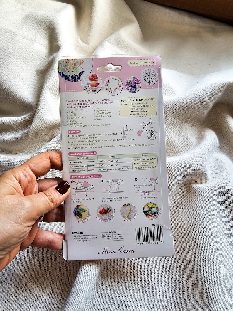 May include: A punch needle set with a variety of needles for different thread thicknesses. The set includes a long needle threader, a fine needle, a medium needle, and a large needle. The packaging also includes instructions on how to use the needles and a description of the different stitches that can be created.