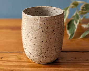 Large ceramic speckled cup in glossy white