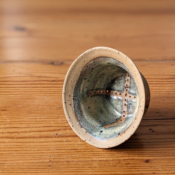 Ceramic tea strainer in gloomy blue