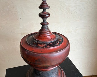 Indian antique bell made of turned wood in red