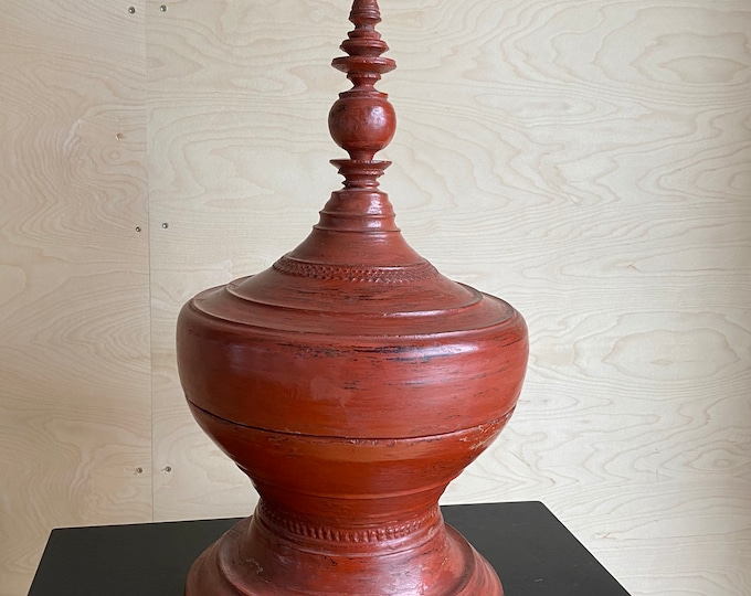 Indian antique bell made of turned wood in red