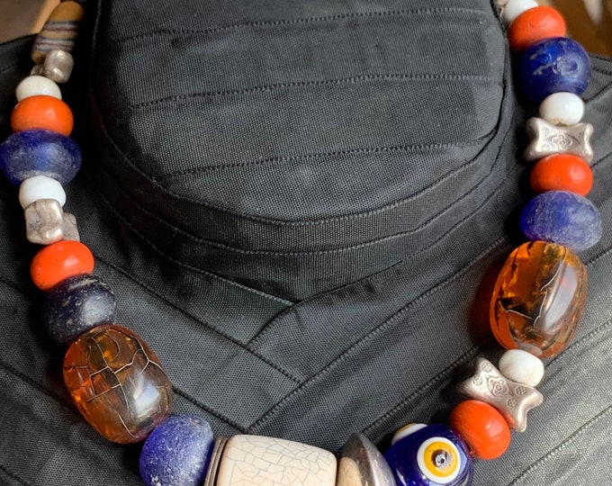 African necklace with eyeglass chevron beads, wooden beads, glass beads, silver parts, coconut flakes