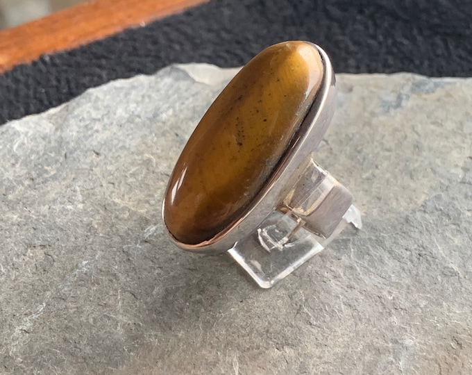 Silver ring with tiger eye