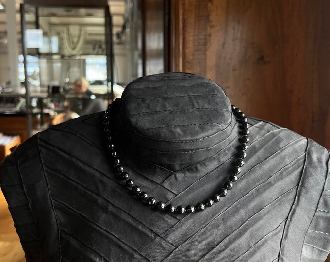 Black spinel with silver