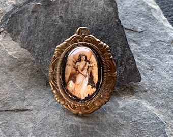 brooch with angel