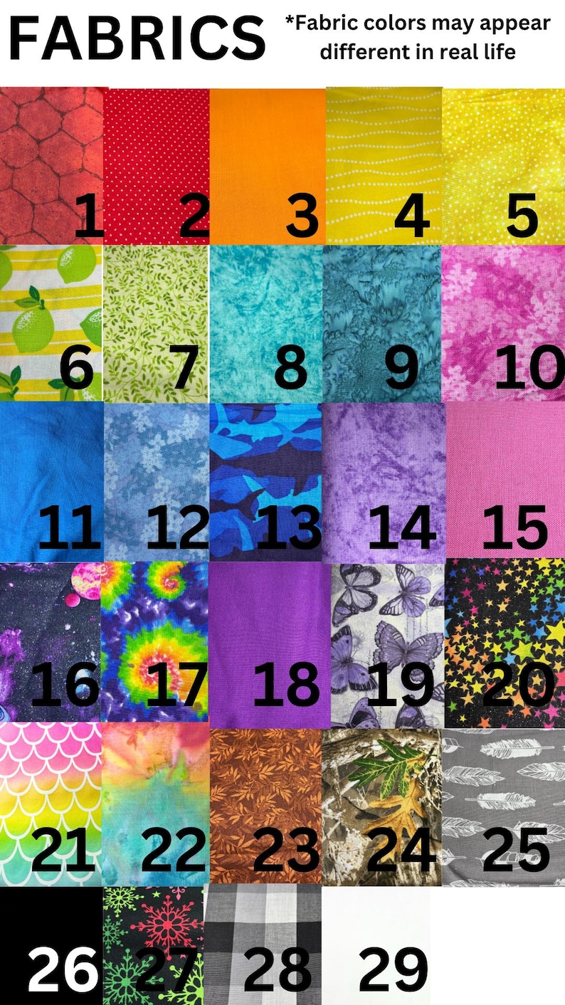 May include: A fabric swatch chart with 29 numbered fabric samples. The fabrics include various colours and patterns, such as red, orange, blue, purple, and green. The word "FABRICS" is at the top.