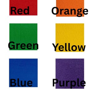 May include: A fleece fabric colour chart showing red, orange, green, yellow, blue, purple, hot pink, black, and white swatches. Each swatch is labelled with its colour name in bold text.