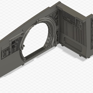 Puede incluir: Un modelo impreso en 3D del interior de una nave espacial con una gran abertura redonda, detallada con tuberías y cables. El modelo está hecho de plástico gris y tiene una superficie texturizada.