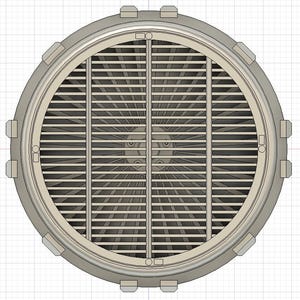 May include: A circular metal object, viewed from above, featuring a grill-like pattern of parallel bars within a circular frame. The frame has evenly spaced rectangular protrusions. The object is likely a mechanical component, possibly a vent or cover.