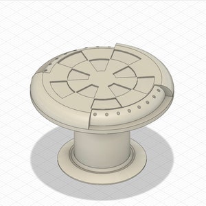 Könnte beinhalten: Ein beiger, runder Tisch mit einer kreisförmigen Tischplatte, die ein segmentiertes Design aufweist. Die Tischplatte hat ein erhabenes, sternförmiges Muster in der Mitte. Der Tisch hat einen zylindrischen Sockel mit einem runden Fuß.