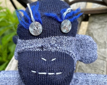 Handmade Ugly but Cute Sock Monkey with crazy eyelashes