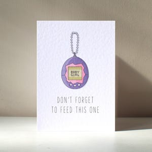 It's a Girl - A6 Baby Neugeborene Retro Digitale Haustier Spiel Gamer kultige Nerd Frech Lustig Wortspiel Glückwünsche Geburtstag Grußkarte