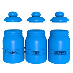 May include: Three blue ceramic canisters with lids, labeled "Sugar", "Tea", and "Coffee".