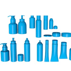 May include: A collection of blue plastic bottles and tubes of various sizes and shapes. The bottles have pumps and caps. The tubes have caps. The bottles and tubes are arranged in a row on a white background.