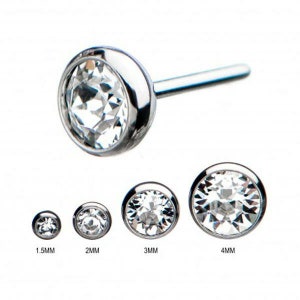 May include: Four sizes of clear crystal prong-set body jewelry, in 1.5mm, 2mm, 3mm, and 4mm sizes. The jewelry is made of surgical steel and is suitable for a variety of piercings.