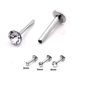 May include: Three silver nose rings with clear crystal stones. The rings are 2mm, 3mm, and 4mm in diameter.