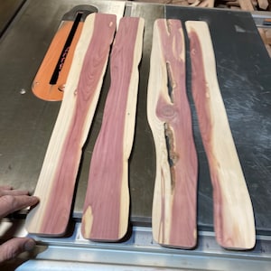 Four plant climbing walls, live edge eastern red cedar, each approximately 2” wide and 3/8” thick, 24” long.