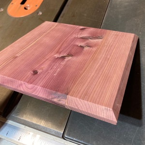 Aromatic Eastern Red Cedar, one mounting plaque at 1/2" x 8” x 8”, surface planed, beveled edges.
