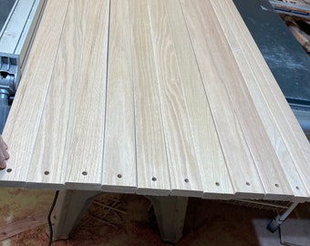 Red Oak slats, 12 pieces total, 9 at 3/4” x 2-1/4” x 48”, 3 at 3/4” x 1-1/2” x 48”, 5/16D” holes 3/4” from each end, centered, rounded edges