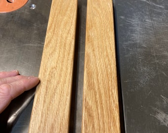 Short Red Oak slats, 2 pcs at 3/4” x 1-7/8” x 10-1/2”, surface planed, rounded edges, w/ outdoor varnish.