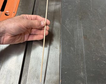 One hard maple dowel rod, approximately 1/8” diameter x 12” long.  Photos for reference only.