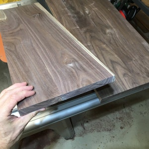 One Black Walnut board, 3/4” x 8-7/8” x 26-3/4”, surface planed.  Message us if you need custom dimensions.