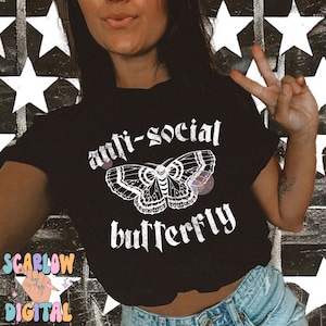 May include: Black t-shirt with a white graphic of a butterfly and the text "anti-social butterfly".