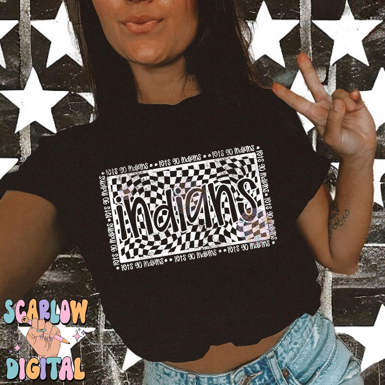 May include: Black t-shirt featuring the word "Indians" in a checkered pattern. The shirt also has the text "lets 90 indians" around the checkered design. The background is a black and white star pattern.