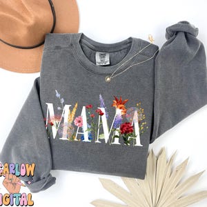 May include: Gray sweatshirt with a floral design spelling out the word "MAMA".